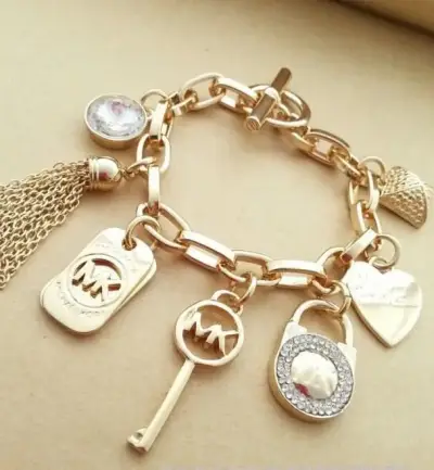 Pulsera Michael Kors con dijes decorativos MK - miniatura 1