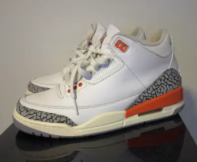 Zapatillas deportivas blancas con detalles naranjas - miniatura 1
