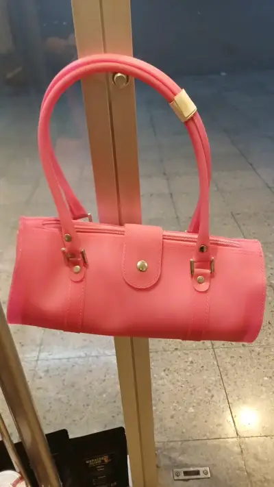 Bolso de mano rosa - miniatura 1