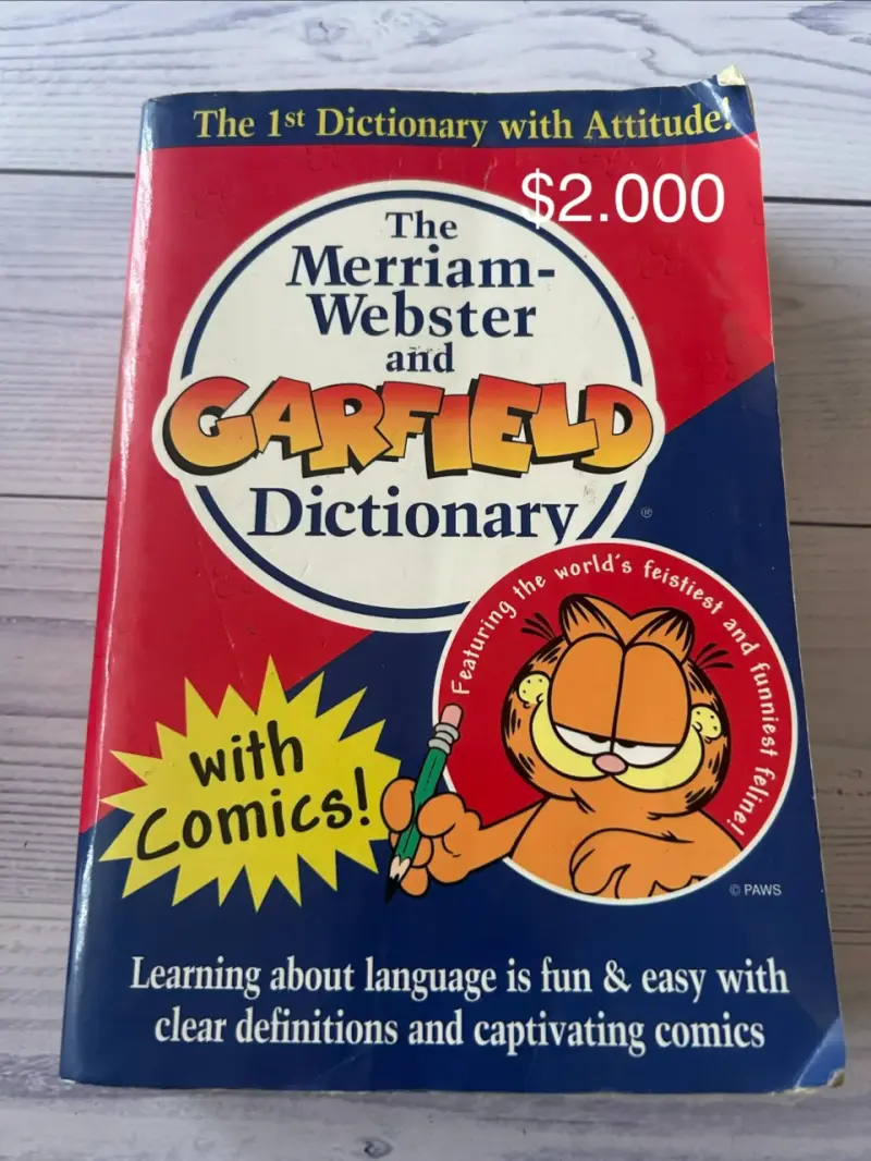 Diccionario Merriam-Webster y Garfield con Comics