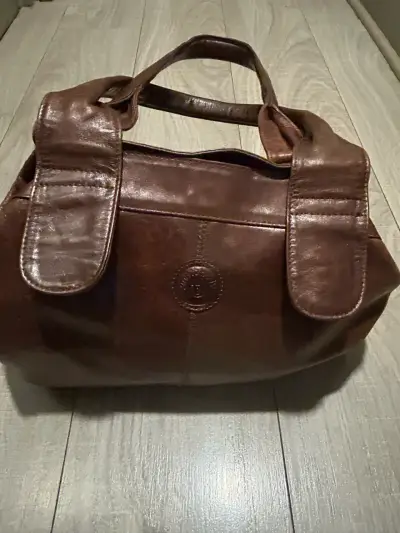 Bolso de cuero marrón elegante - miniatura 1