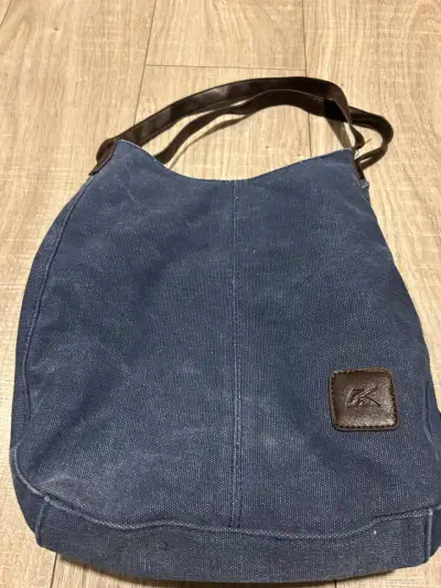 Bolso de lona azul con asa de cuero - miniatura 1