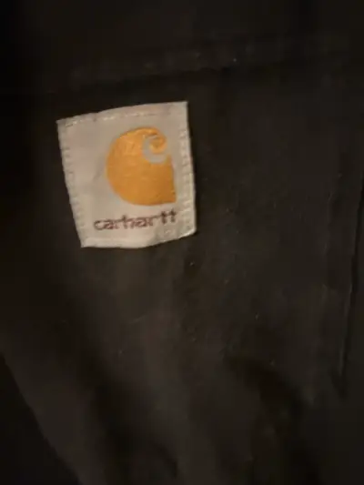 Polera negra Carhartt con bolsillo - miniatura 6