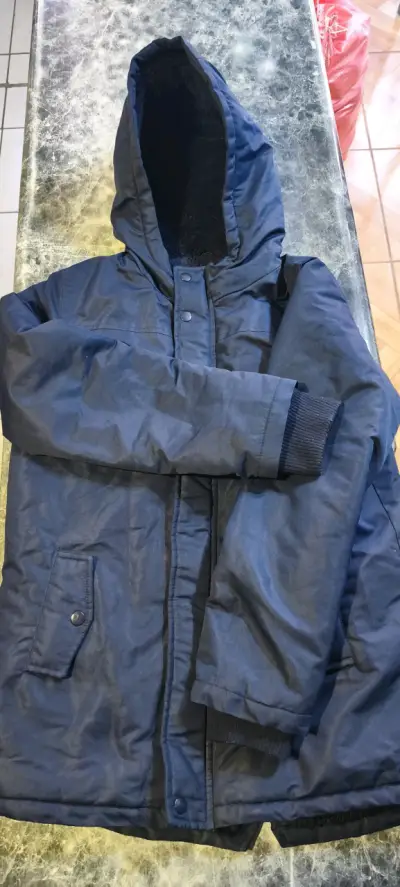 Parka azul con capucha para invierno - miniatura 1