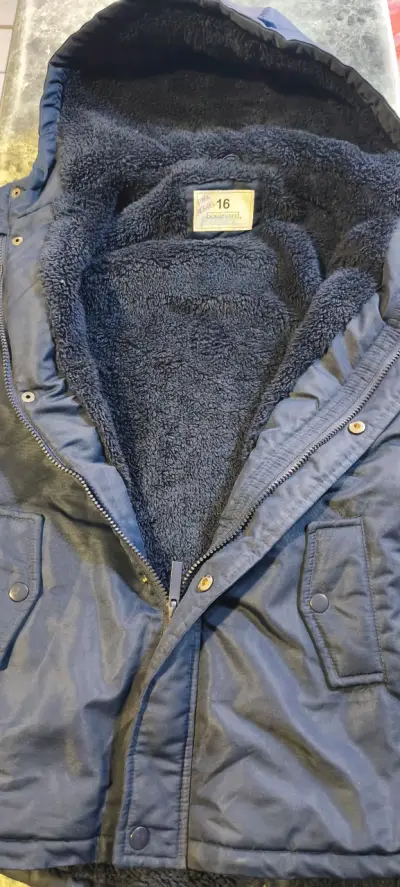 Parka azul con capucha para invierno - miniatura 2