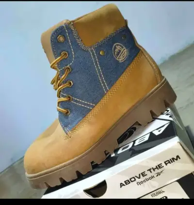 Botas  con diseño denim y cuero - miniatura 1