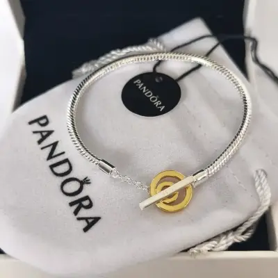 Pulsera Pandora de plata con dije dorado 17 - miniatura 1