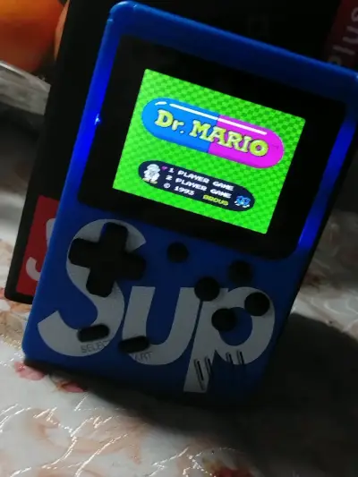 Consola portátil retro SUP con juegos clásicos - miniatura 1