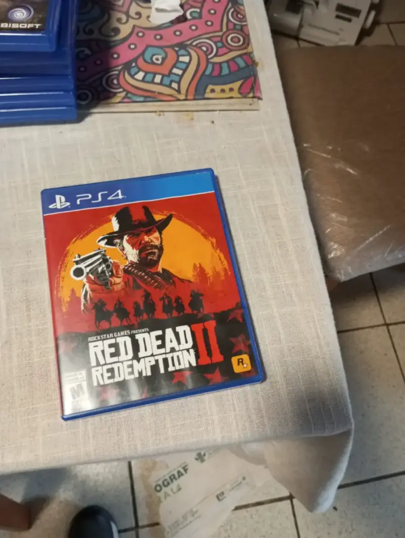 Juego PS4 Red Dead Redemption II en buen estado - 1