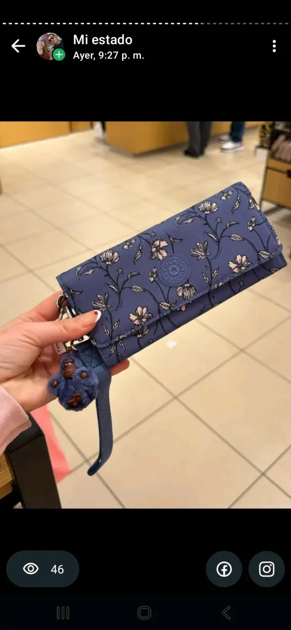 Billetera Kipling azul floral con llavero