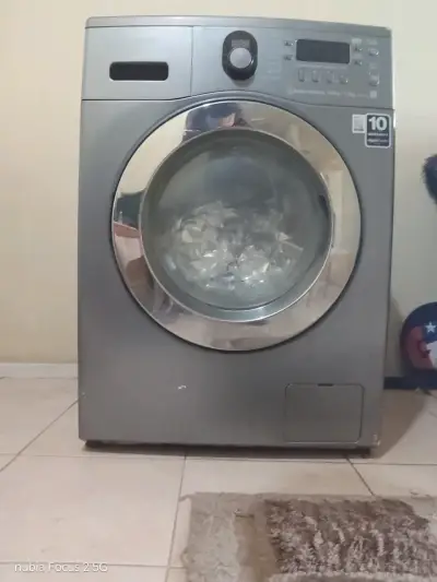 Lavadora LG carga frontal 10 kg gris - miniatura 1