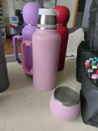 Termo de acero inoxidable rosado con taza - miniatura 1