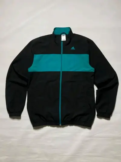 Cortavientos Adidas negro y calipso - miniatura 1