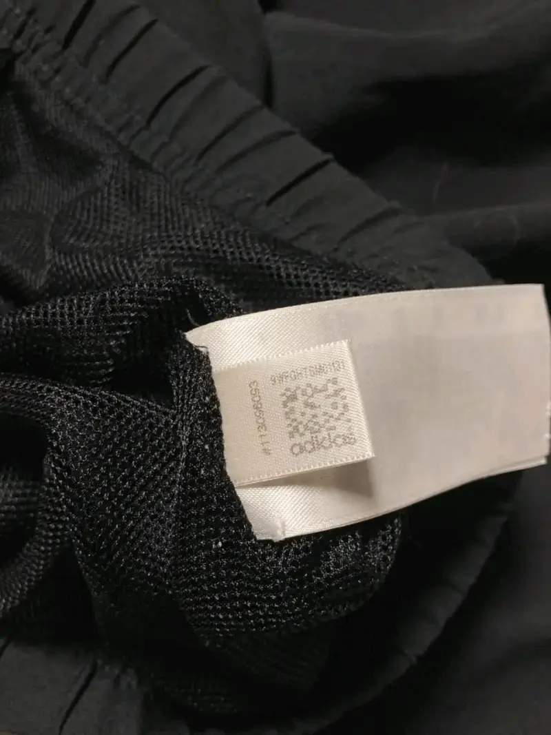 Cortavientos Adidas negro y calipso - 6
