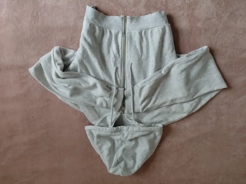 Chaleco color gris entre blanco