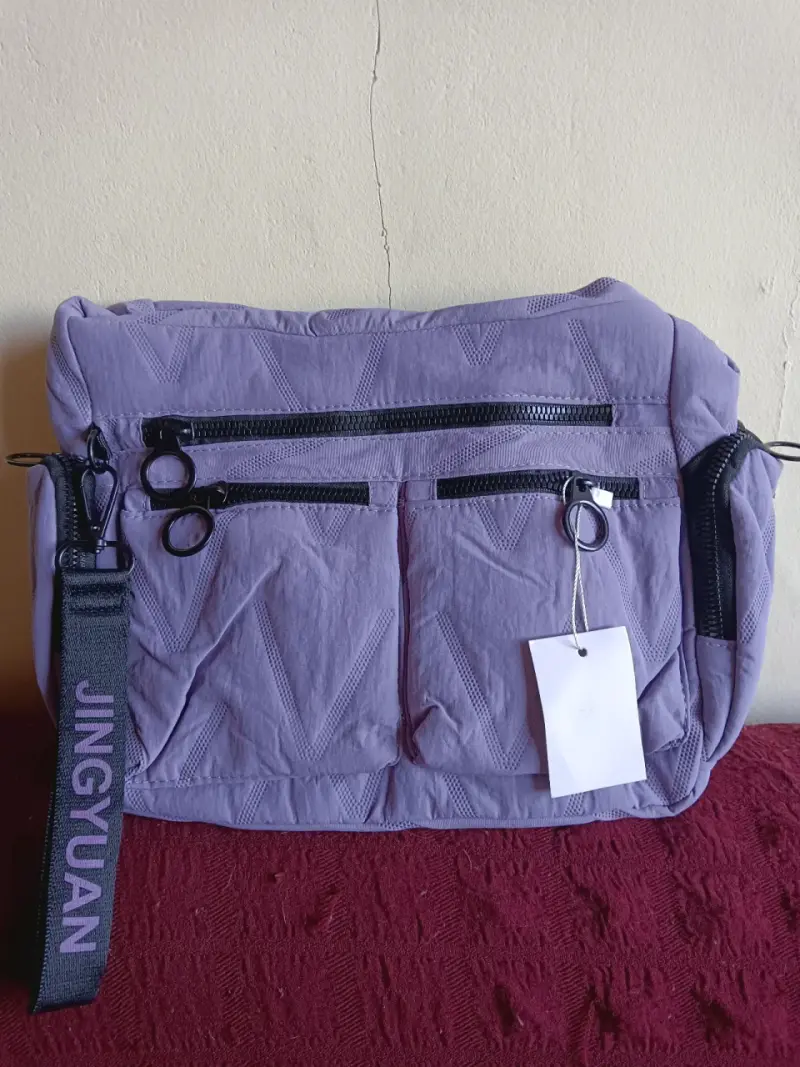Bolso bandolera azul con múltiples bolsillos - 2