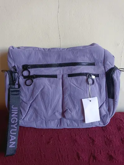 Bolso bandolera azul con múltiples bolsillos - miniatura 2