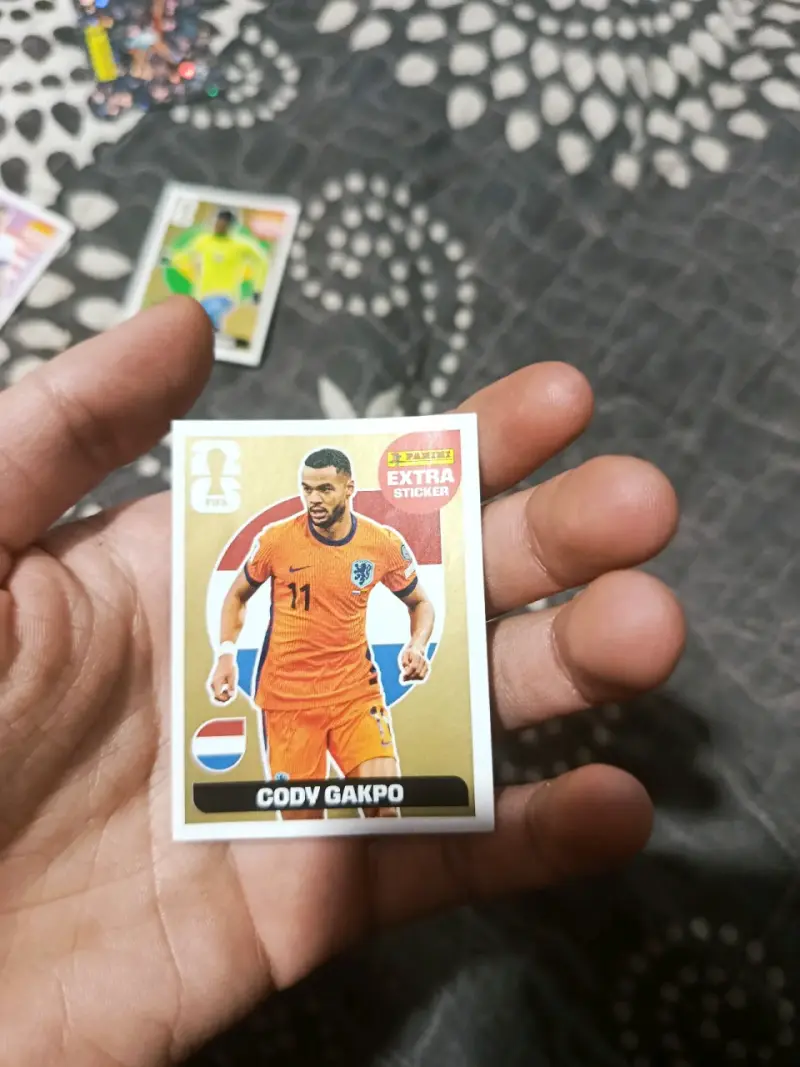 Lámina Extra Sticker Oro Panini Cody Gakpo - 1
