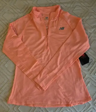 Polera deportiva mujer New Balance coral - miniatura 1