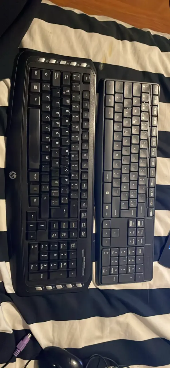 Teclado HP negro con teclas multimedia - 1