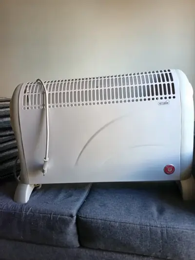 Calefactor eléctrico de pared color blanco - miniatura 1