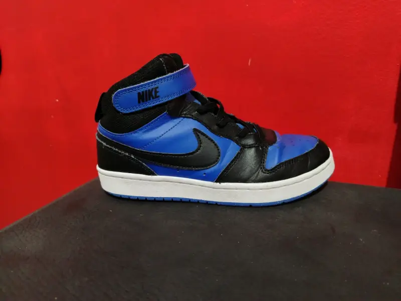 Zapatillas deportivas Nike niño azul y negro - 1