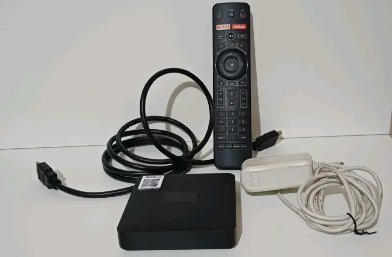 Decodificador de TV con control remoto y cables - 1