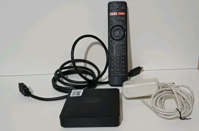 Decodificador de TV con control remoto y cables - miniatura 1