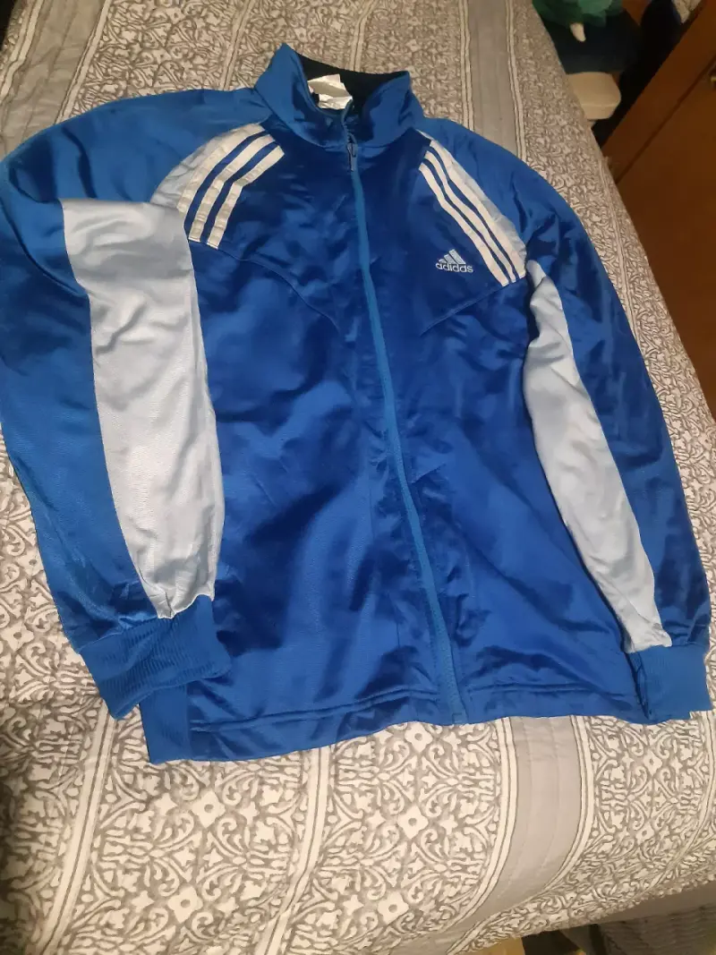 Chaqueta deportiva Adidas azul y gris