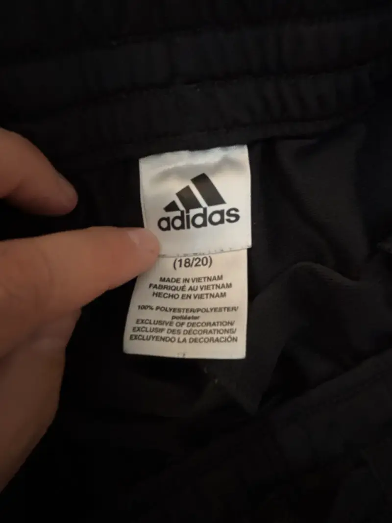 Pantalones deportivos negros con franjas rojas - 5