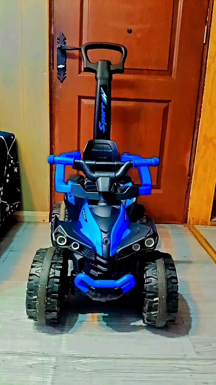 Auto eléctrico para niños azul con manillar - 2