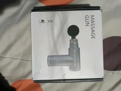 Pistola de Masaje Portátil con Batería Recargable - miniatura 1