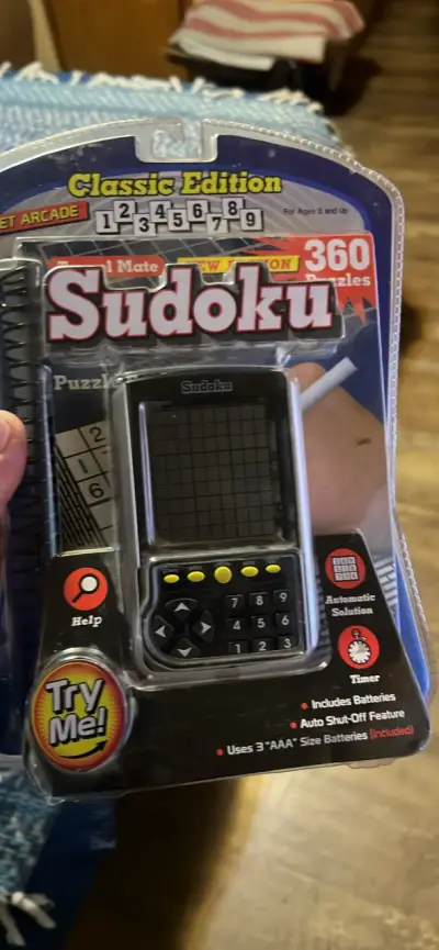 Juego electrónico de Sudoku y Solitario - miniatura 1