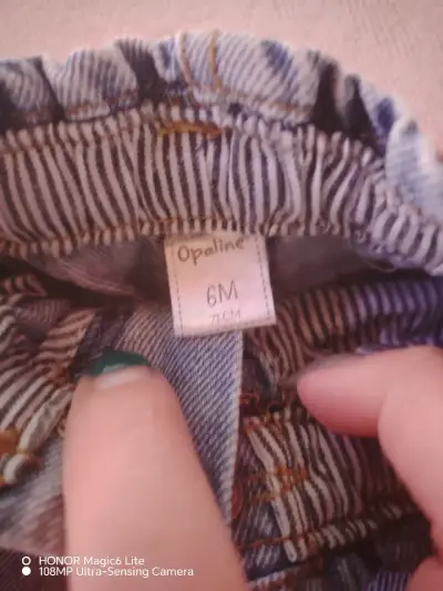 Shorts de mezclilla para niña con cinturón rosa - miniatura 2