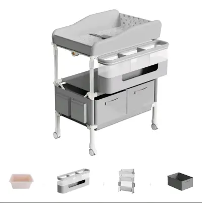 Mudador de bebé plegable y almacenamientos - miniatura 1
