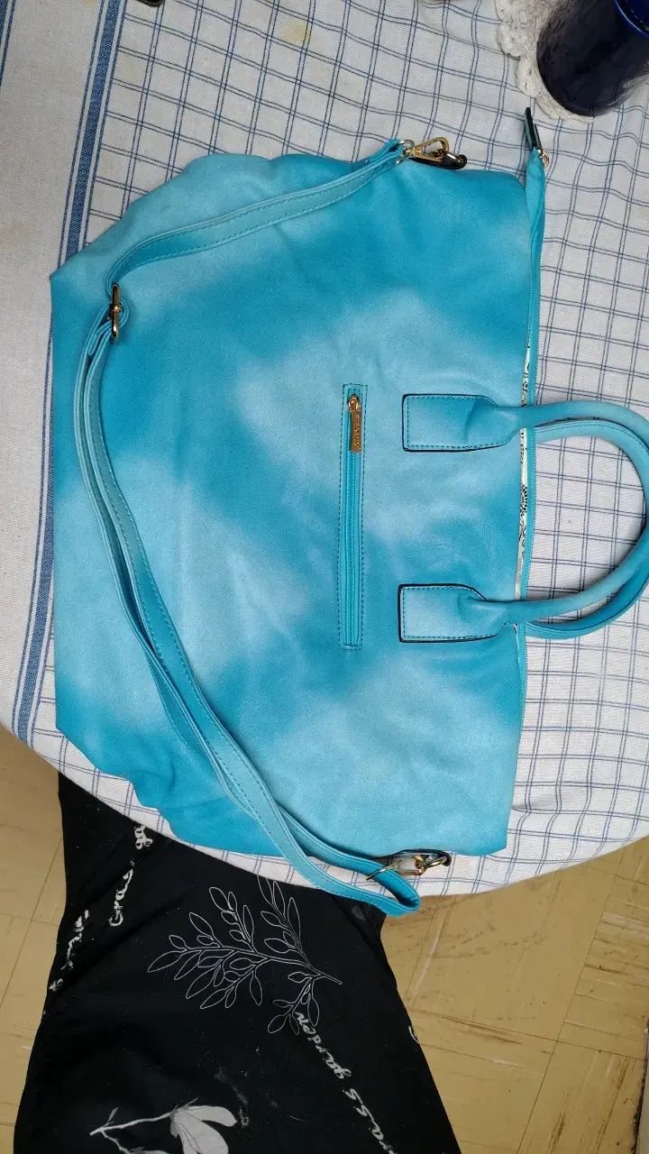 Bolso de mano azul con diseño trenzado - 3