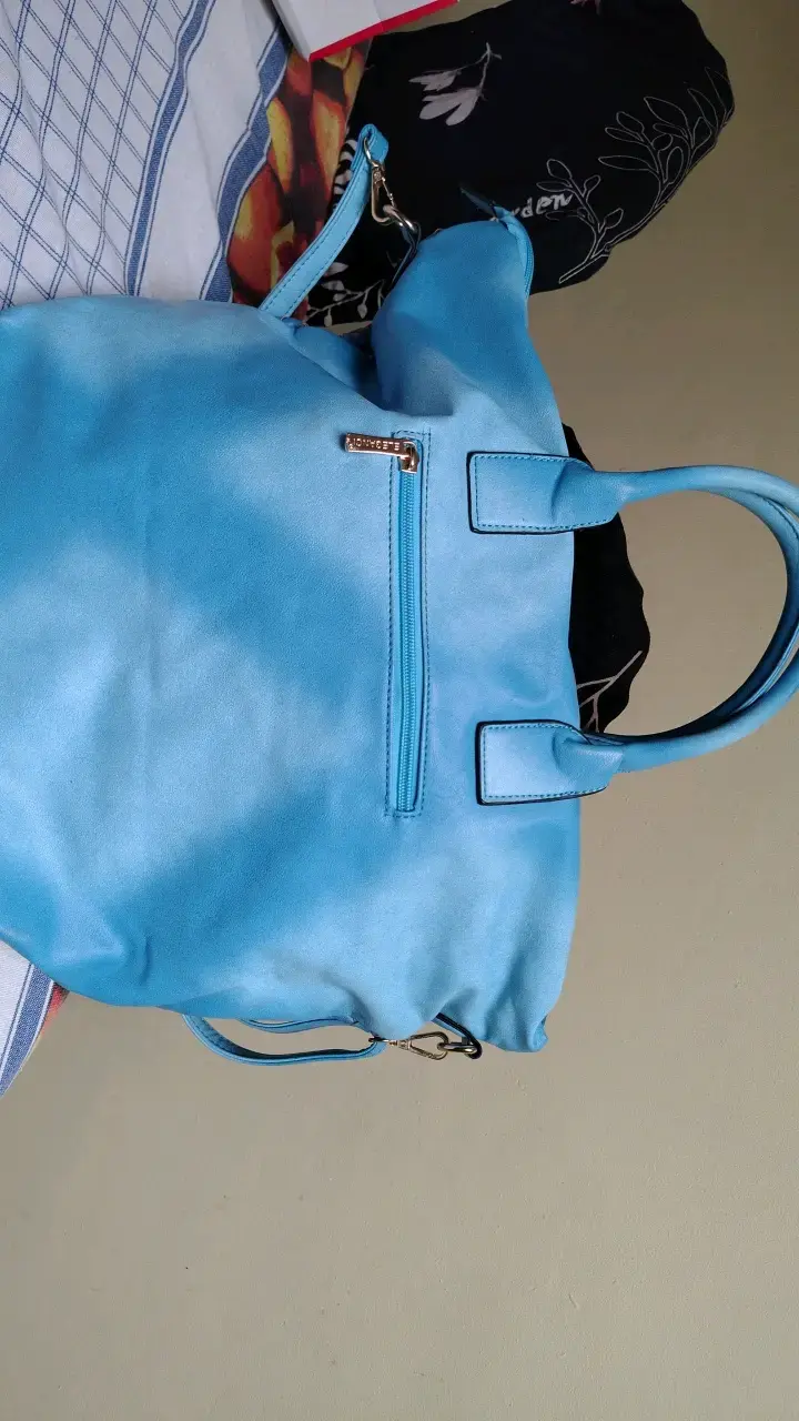 Bolso de mano azul con diseño trenzado - 6