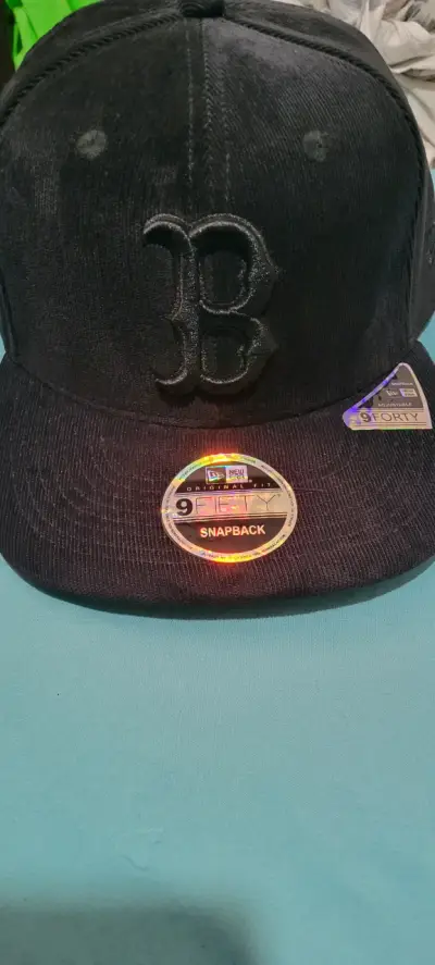 Gorra negra New Era 9Fifty Snapback - miniatura 1
