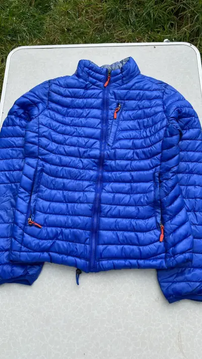 Chaqueta acolchada azul para mujer - miniatura 1