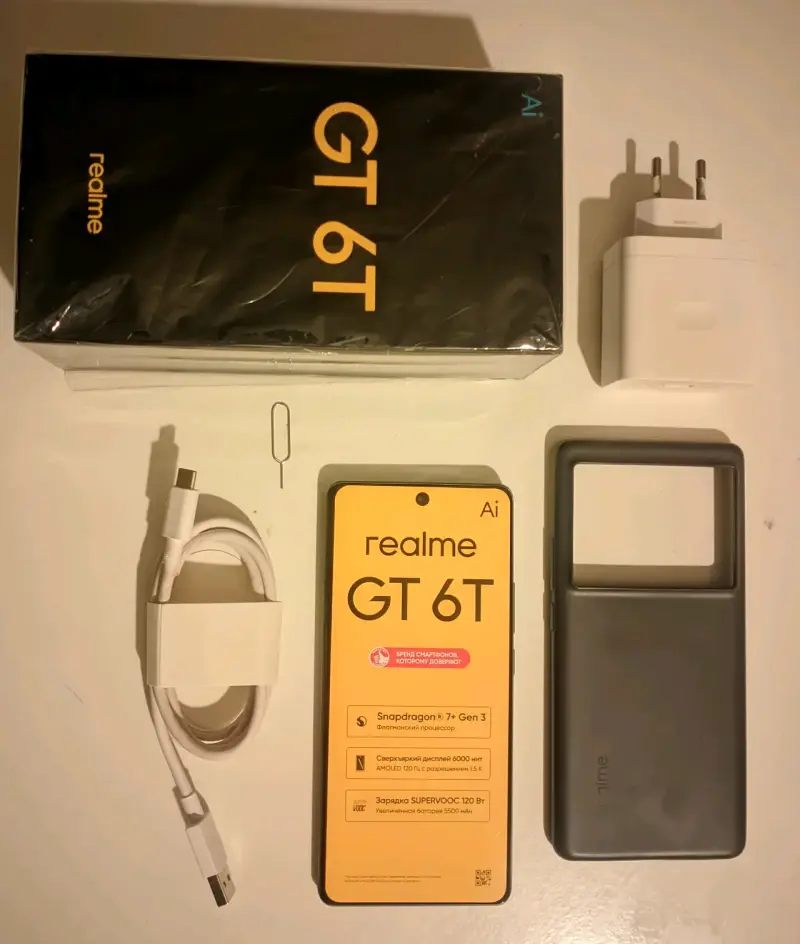 Smartphone Realme GT 6T con cargador y accesorios - 1