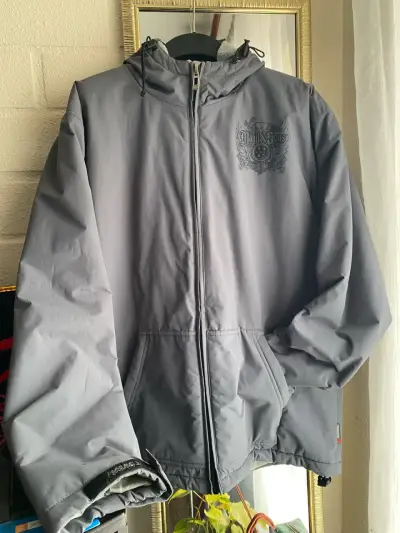 Chaqueta gris con capucha maui - miniatura 1