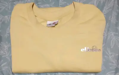 Poleron amarilla Ellesse para mujer - miniatura 1