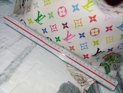 Bolso de mano multicolor con diseño elegante - miniatura 3