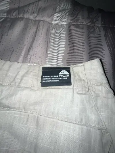 Pantalones cargo beige Nike ACG talla 34 - miniatura 6