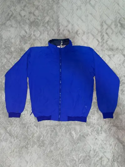 Chaqueta azul unisex con cierre frontal - miniatura 1