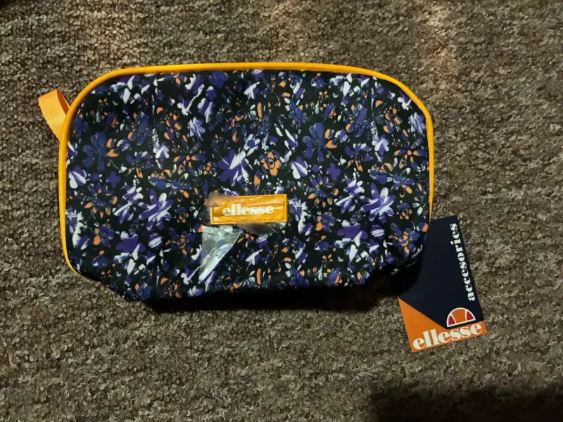 Neceser Ellesse floral con borde naranja - 1