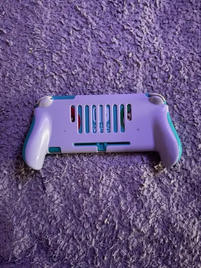 Nintendo Switch Lite turquesa con juegos y accesorios - miniatura 6