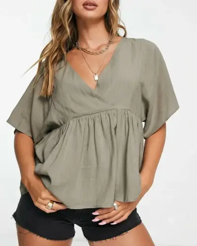 Blusa marca Asos talla M verde diseño cruzado - miniatura 4