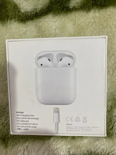 Apple AirPods con Estuche de Carga - miniatura 1