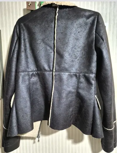 Chaqueta de cuero sintético con forro de lana - miniatura 1